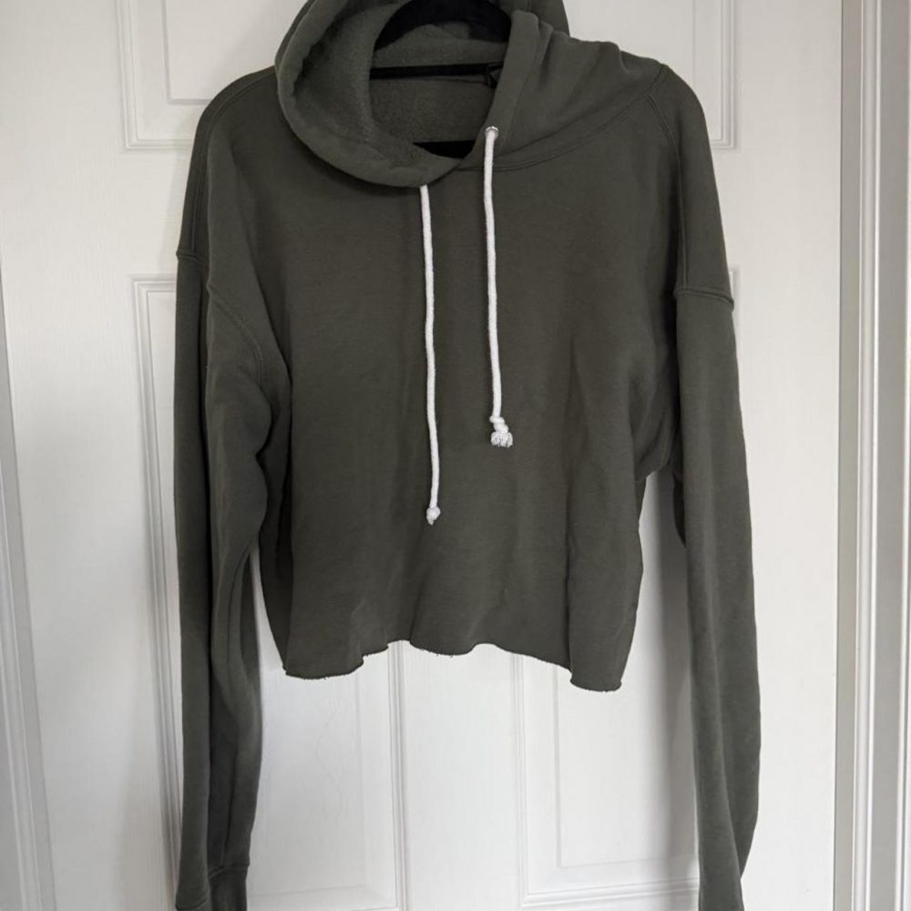 Relaxed boxy fit with dropped shoulders, oversized long sleeves, hood with contr